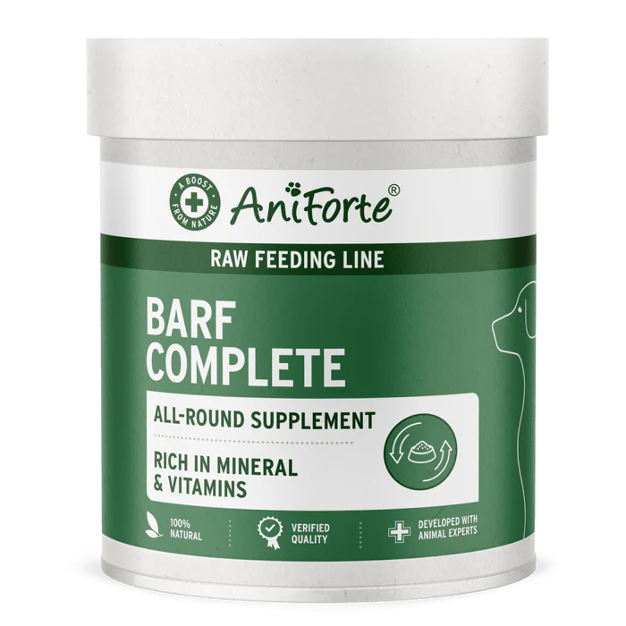 Green & white Aniforte BARF Complete for Dogs 500g, a raw feeding additive rich in minerals and vitamins.