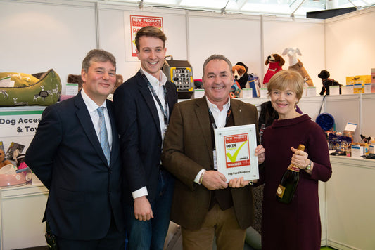 nutriment team holding award