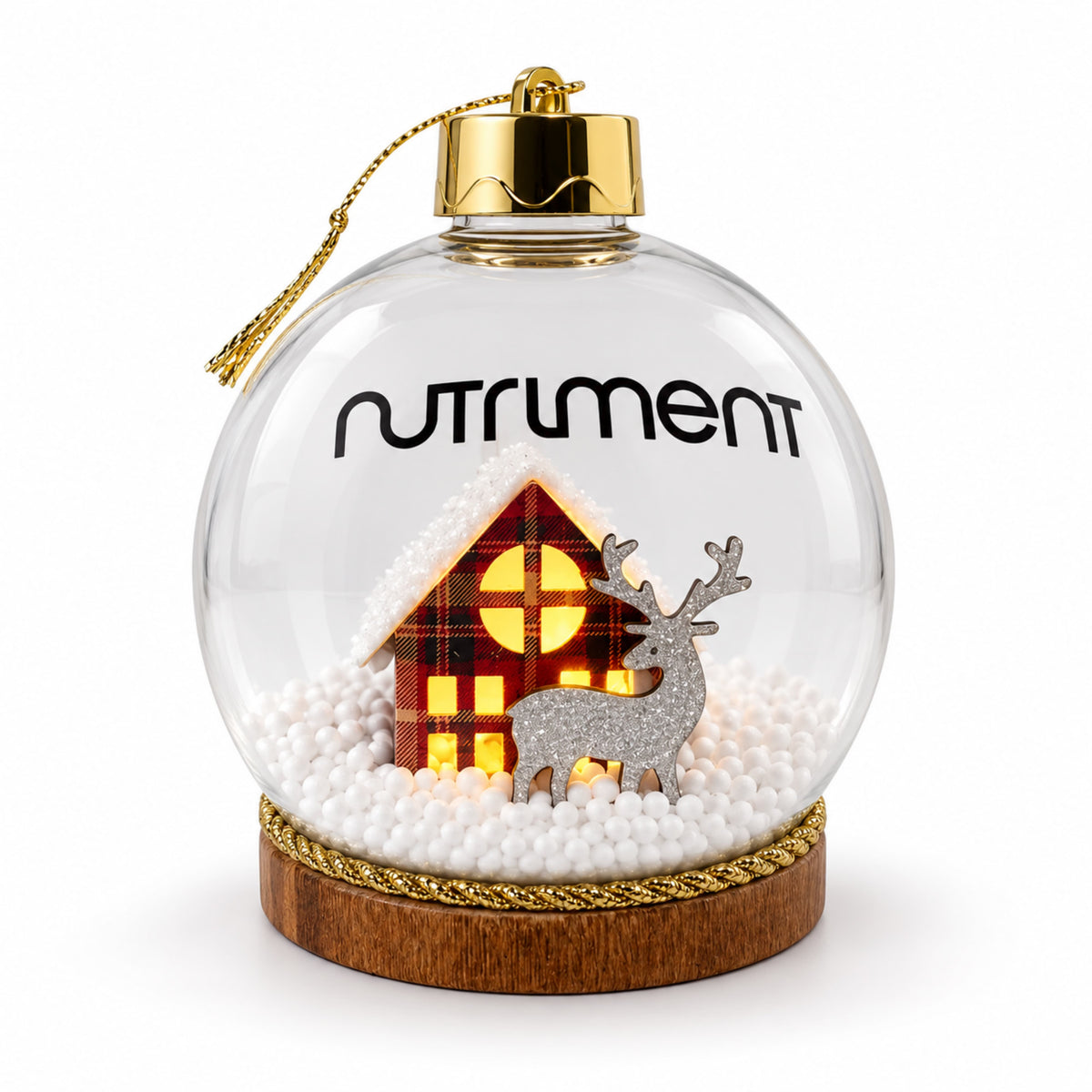 Light-Up Christmas Bauble 1pc featuring a plaid house, silver reindeer, and white filler on a wooden base.