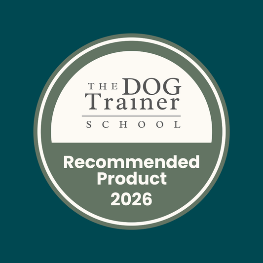 Circular badge reading "The Dog Trainer School Recommended Duck Gourmet Slices 200g 2026" on dark green background.