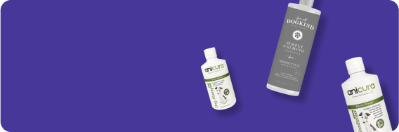 Various pet care product bottles arranged against a solid purple background.