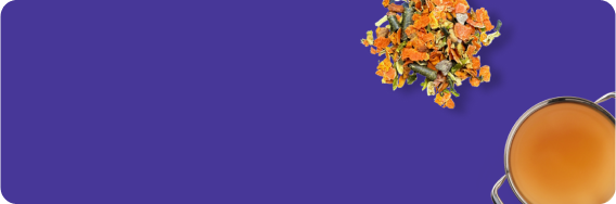 Orange pot and dried marigold flowers on a purple background.