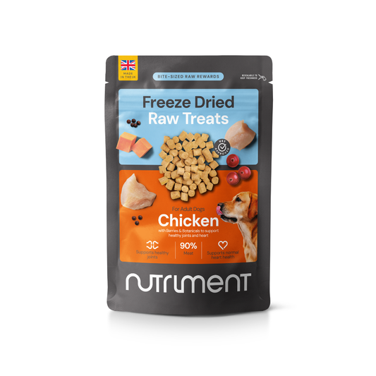 Front of a Freeze Dried Treats - Chicken 30g bag with images of chicken and a dog.