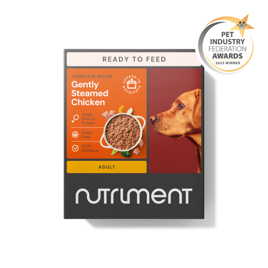 Gently Steamed Chicken 395g box with dog image and pet industry award badge.