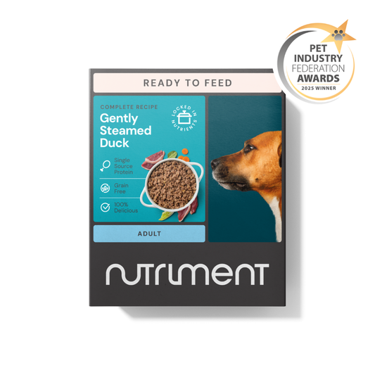 Gently Steamed Duck 395g—easy to digest dog food, featuring a dog’s profile and an award badge.