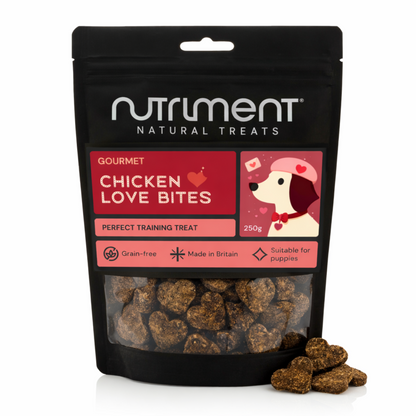 Black pouch of Chicken Gourmet Love Bites (250g), grain-free dog treats with heart shapes on the label.