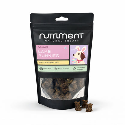 A black pouch of Gourmet Lamb Bunnies (200g) dog treats with limited ingredients features a bunny on the label.